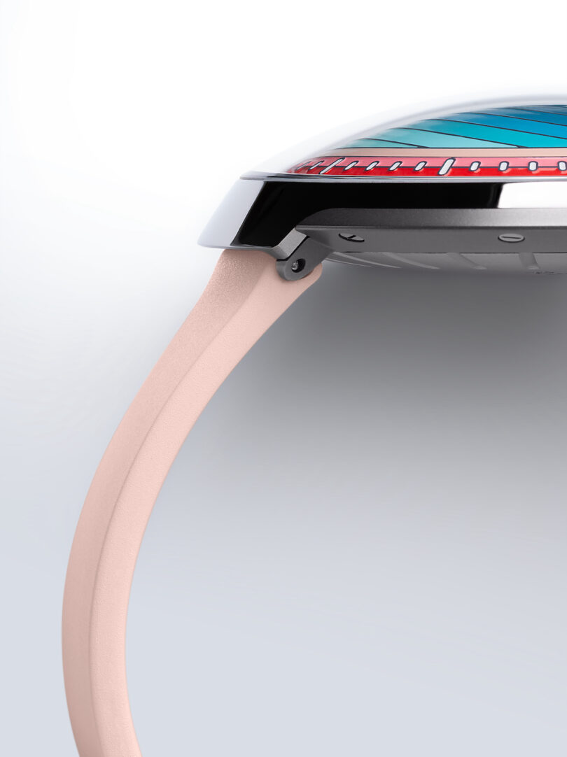 close up of A modern wristwatch with a pink band 