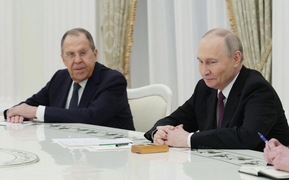 Russia's president Vladimir Putin and foreign minister Sergei Lavrov in Moscow, Russia on Friday. Photo: Reuters