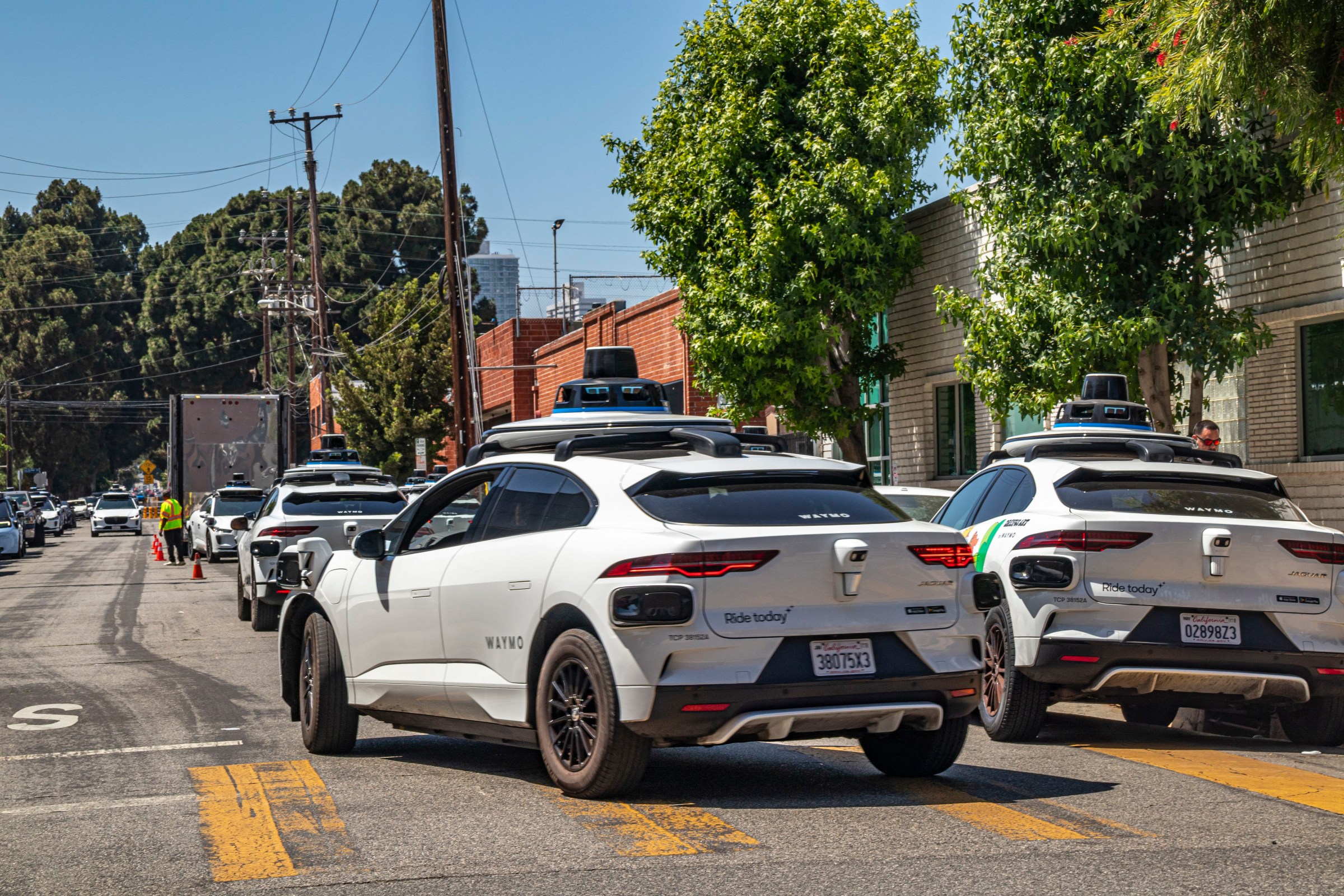 Dozens of new driverless Waymo cars on the streets in West Los Angeles.