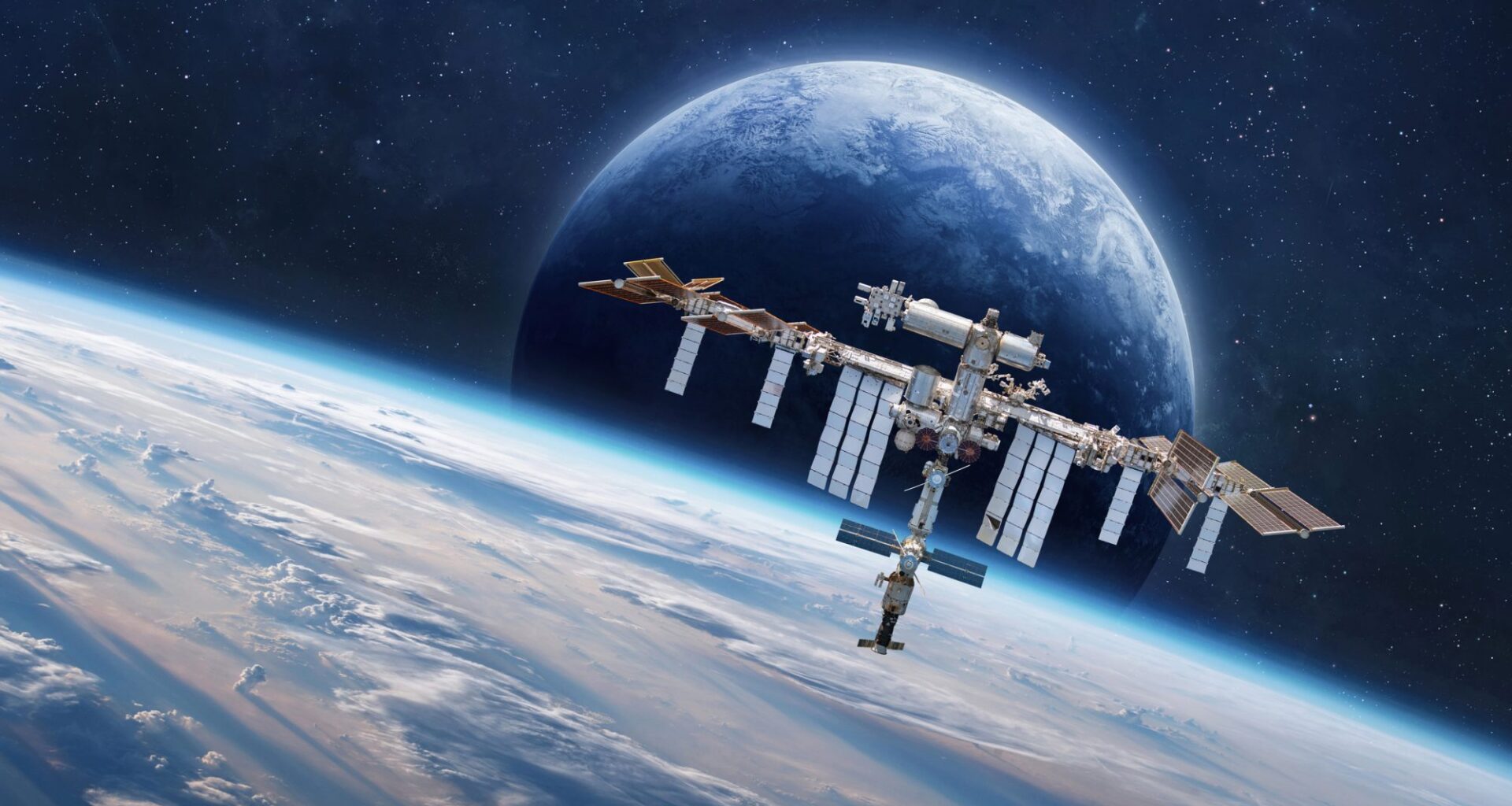 International Space station on orbit of Earth. Space wallpaper with ISS and planet surface. Astronauts in space. Elements of this image furnished by NASA