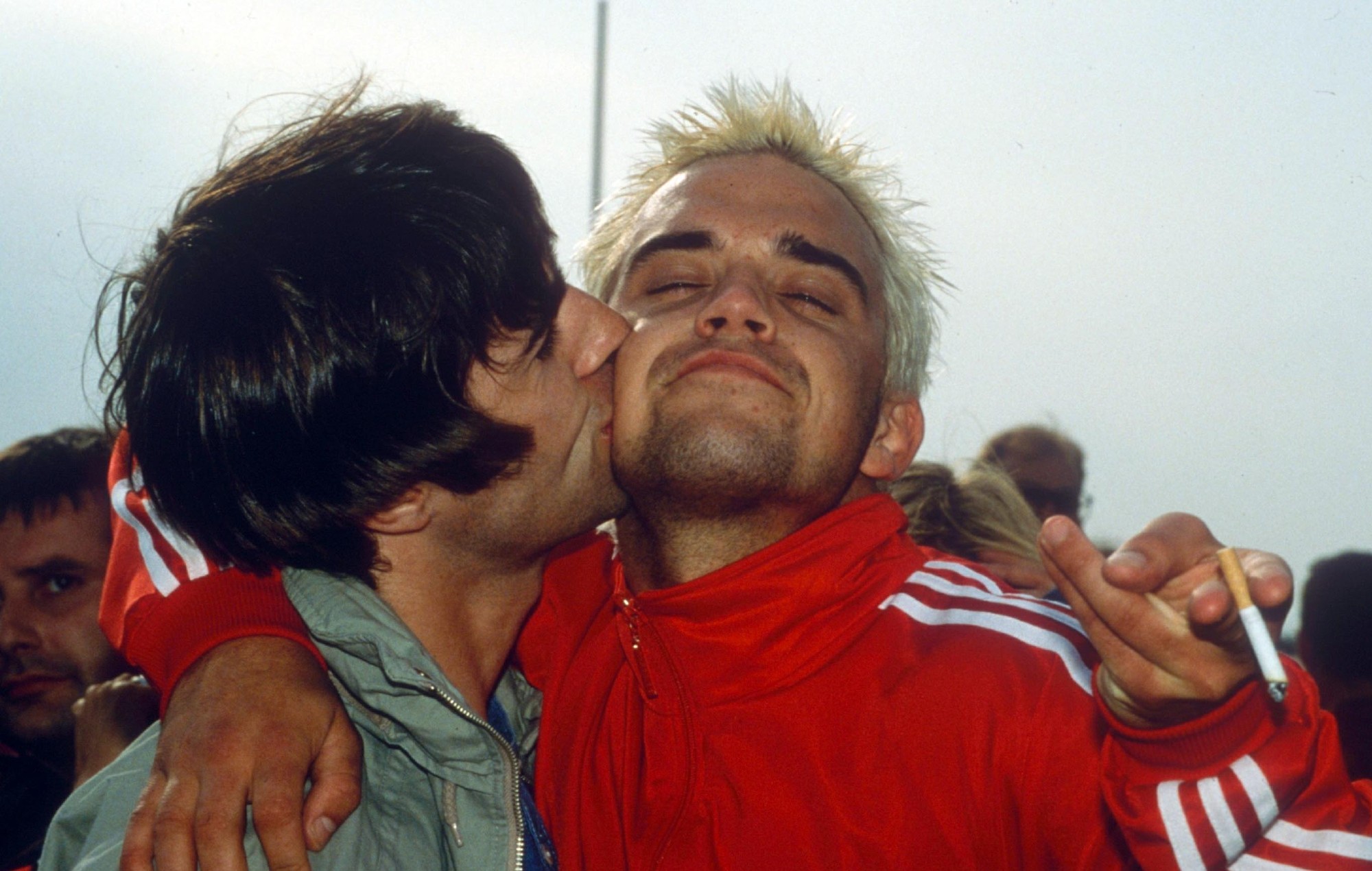 Oasis' Liam Gallagher and Robbie Williams at Glastonbury Festival in 1995