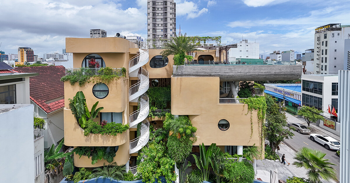 pool cantilevers from the facade of ho khue's hotel in vietnam