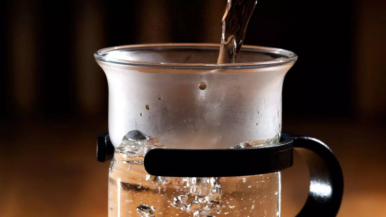 Start the day with warm water before coffee