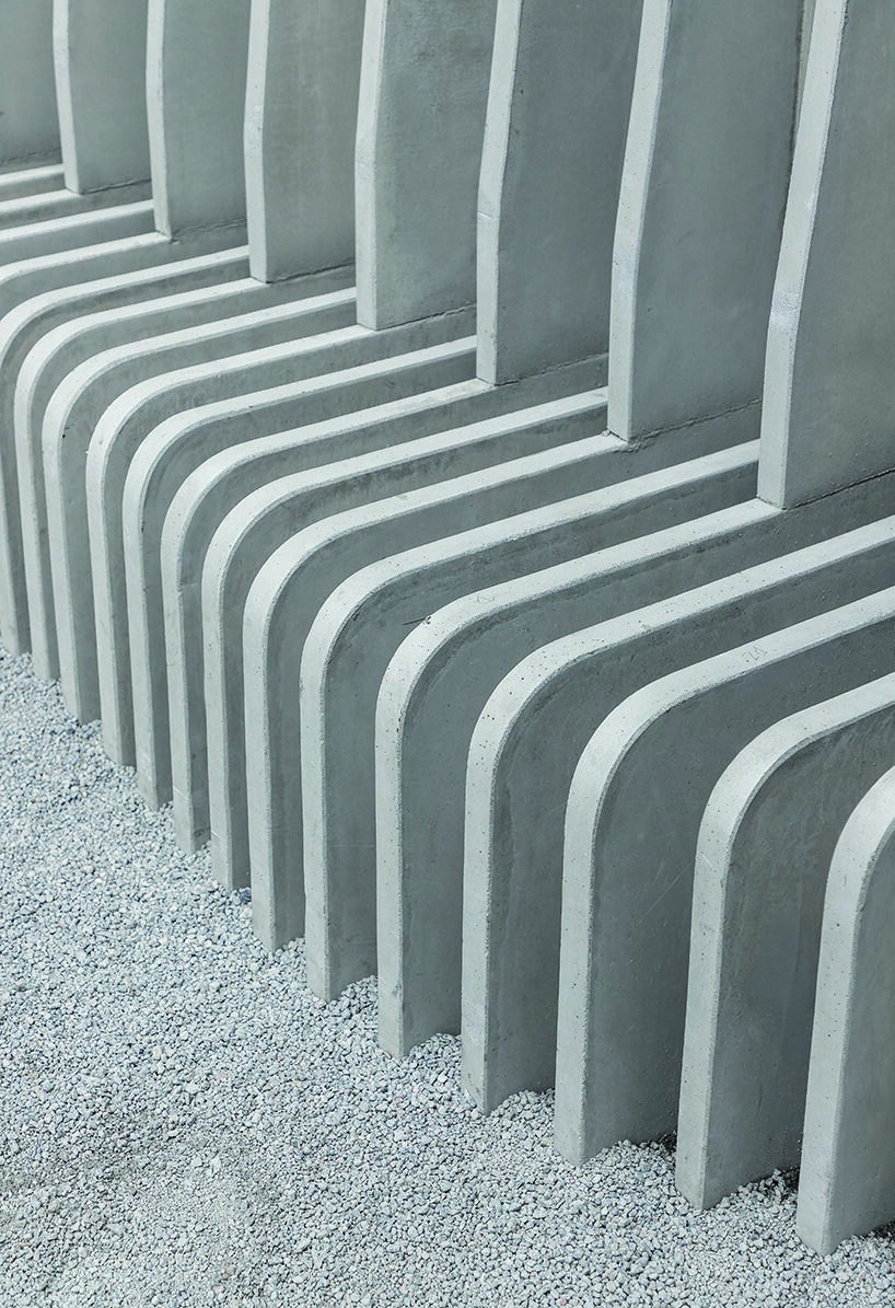 jgstudio transforms public bathroom into undulating concrete installation in ecuador