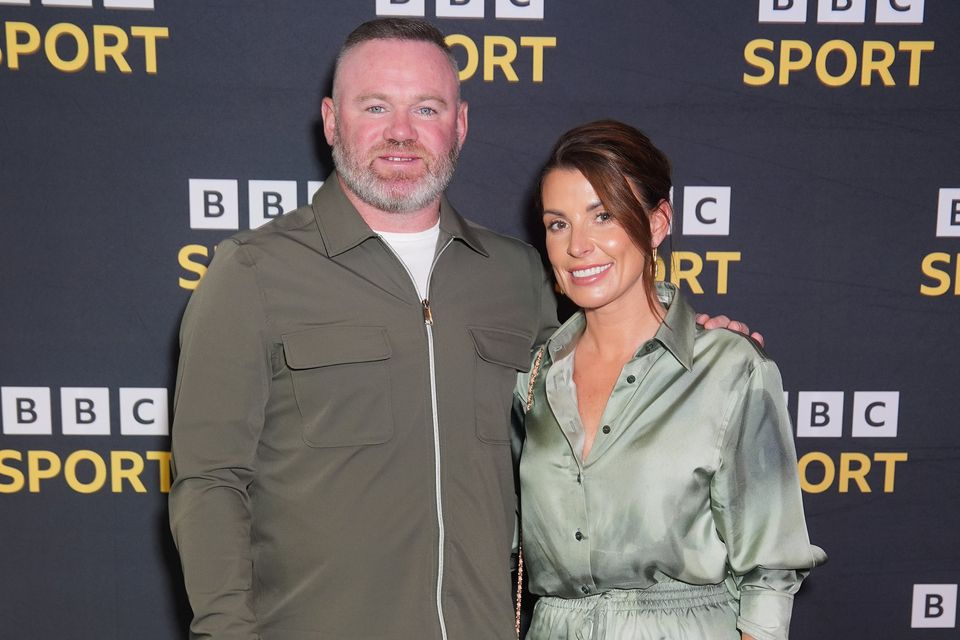 Wayne and Coleen Rooney. Photo credit: Yui Mok/PA Wire.