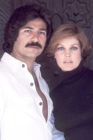Ron Galella via Getty  Priscilla Presley and boyfriend Robert Kardashian on March 27, 1976 pose for an exclusive photo session at her home in Beverly Hills, California.