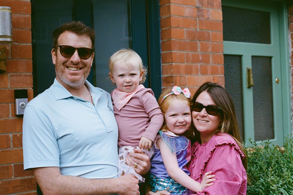 Homeowners Alistair Veltom and Emma Fox, with their daughters Rua and Noa
