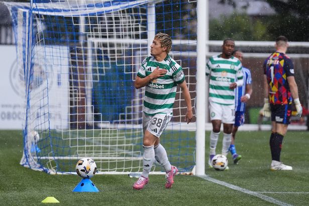 Celtic's Daizen Maeda (left) celebrates after scoring