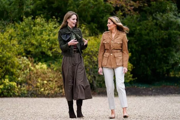 WINDSOR, ENGLAND - SEPTEMBER 18: U.S. First Lady Melania Trump (R) and Catherine, Princess of Wales tour the grounds of Frogmore Cottage where they met members of the Scouts' Squirrels programme, during the State visit by the President of the United States of America and U.S. First Lady Melania Trump, on September 18, 2025 in Windsor, England. (Photo by Nathan Howard - WPA Pool/Getty Images)