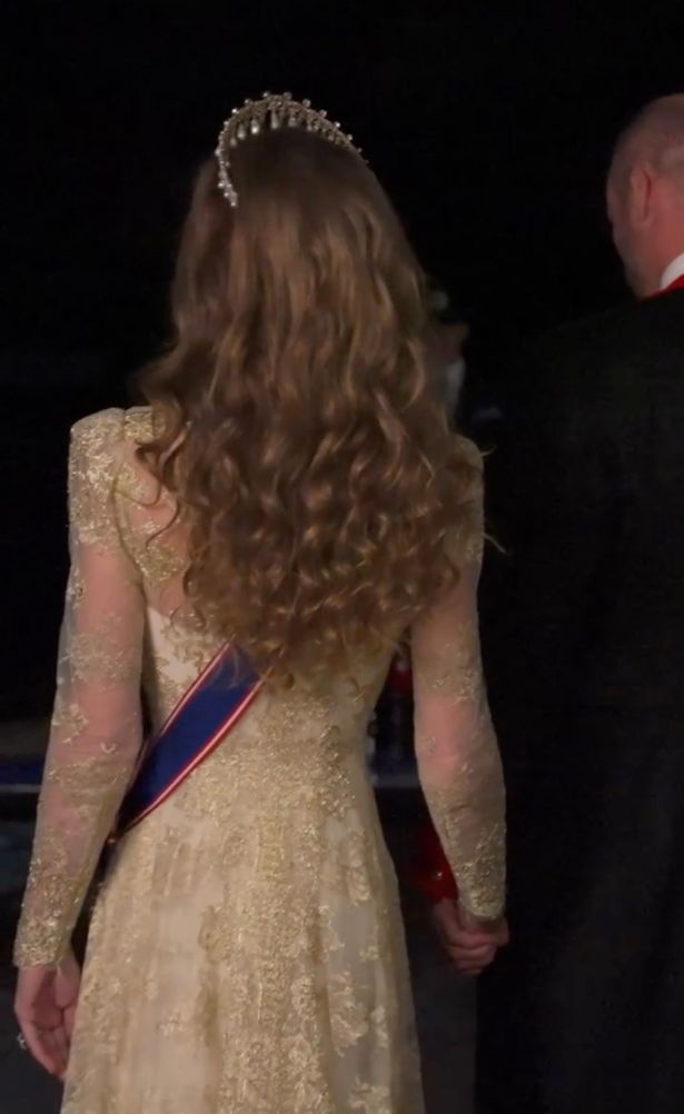 William and Kate hold hands