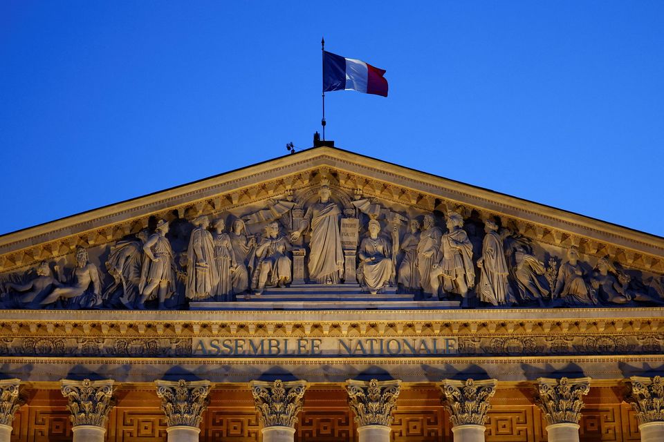 A French flag flutters on top of the National Assembly ahead of a confidence vote that the French prime minister Francois Bayrou lost. Photo: Reuters