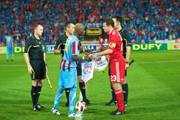TRABZON, TURKEY - Thursday, August 26, 2010: Liverpool's captain Jamie Carragher and Trabzonspor's Ibrahima Yattara during the UEFA Europa League Play-Off 2nd Leg match at the Huseyin Avni Aker Stadium. (Pic by: David Rawcliffe/Propaganda)