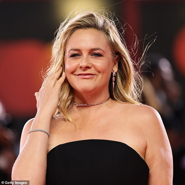 The 48-year-old Clueless icon wowed in a strapless black mini dress