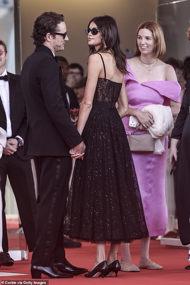 Kaia and Lewis, whose romance was revealed back in July, put on a loved-up display as they attended the red carpet together