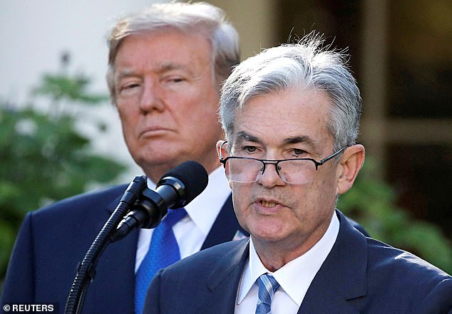 Donald Trump has repeatedly demanded the Fed, led by chairman Jerome Powell, (pictured together) reduce its key interest rate, which has been kept unchanged for the last five meetings