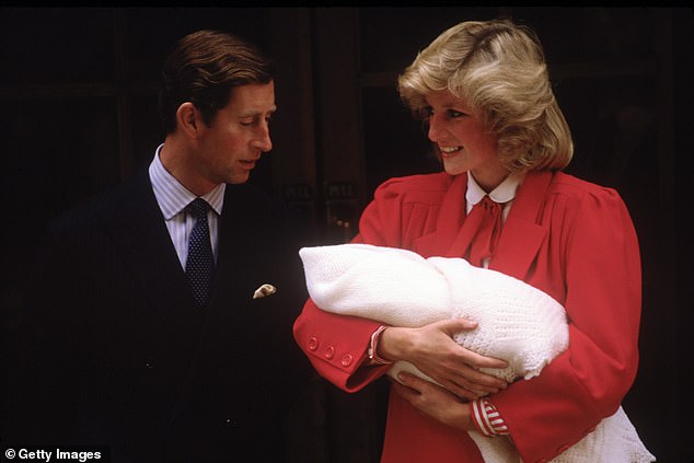 Charles and Diana, wearing an outfit designed by Jan Van Velden, are pictured with newborn Prince Harry