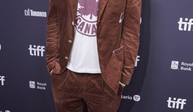 Ryan Reynolds cut a dapper figure in a casual suit when he joined Tom Hanks' nepo baby son Colin Hanks on the red carpet at the Toronto International Film Festival on Thursday evening