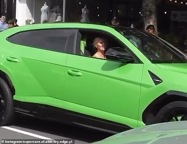 Kerry was easy to spot in her neon green car which she bought after overcoming bankruptcy, as she drove down a busy street in Alderley Edge