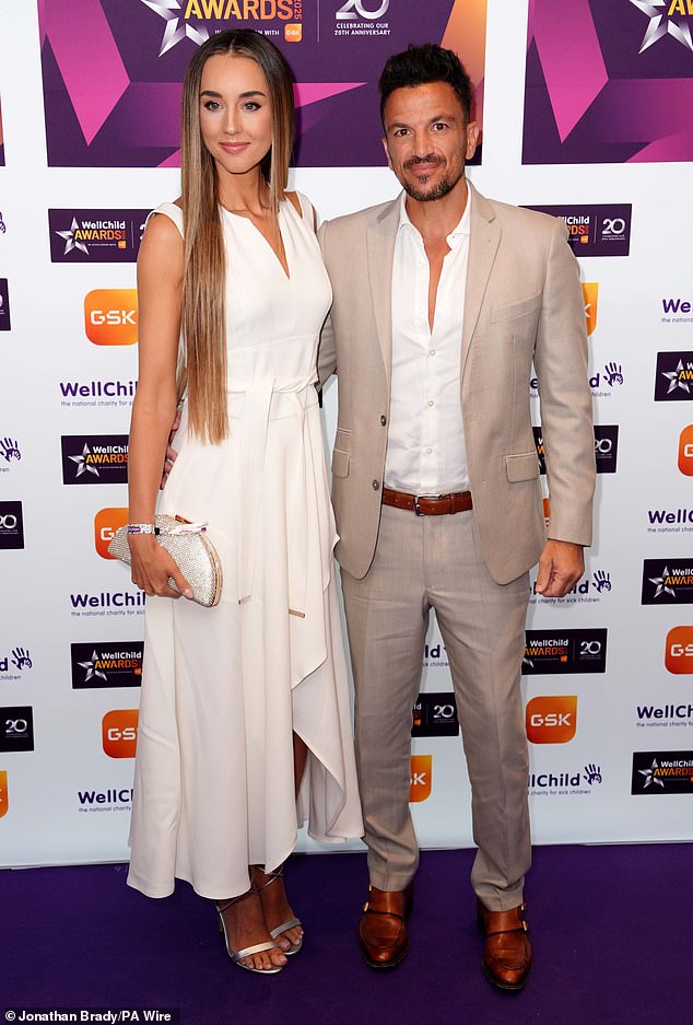 The Mysterious Girl hitmaker opted for a sharp cream suit while Emily stunned in an elegant white dress with matching accessories.