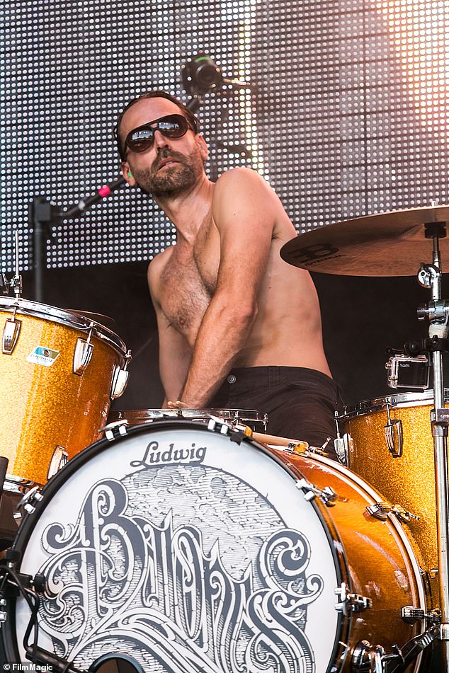 After hearing the news of Allen's passing, fans were left devastated as they flooded the band's tribute with messages (Allen pictured in 2013)