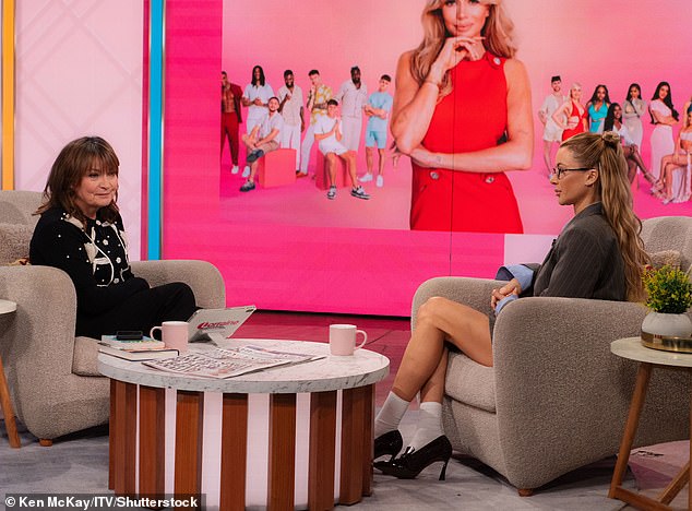 Lorraine then probed the reality star on how she dealt with the fallout of being 'photographed cuddling a male friend', to which Olivia responded: 'I don't deep into it that much'