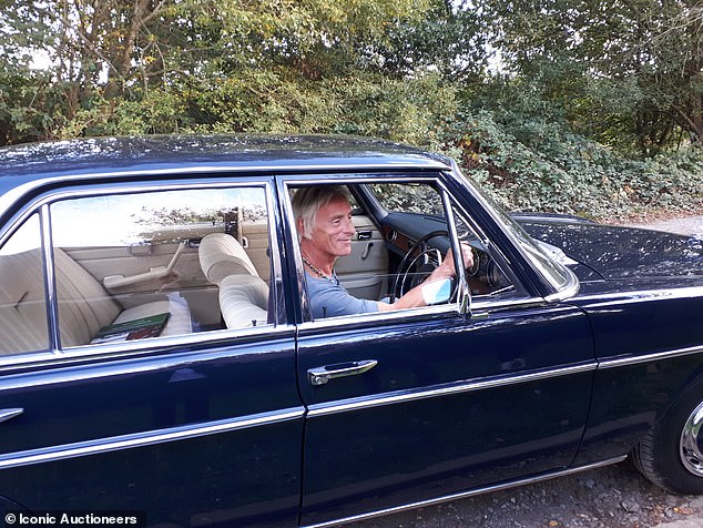 Paul Weller pictured with the 1972 Mercedes he owned for 18 years between 1996 and 2014. The car is now set to be sold to the highest bidder