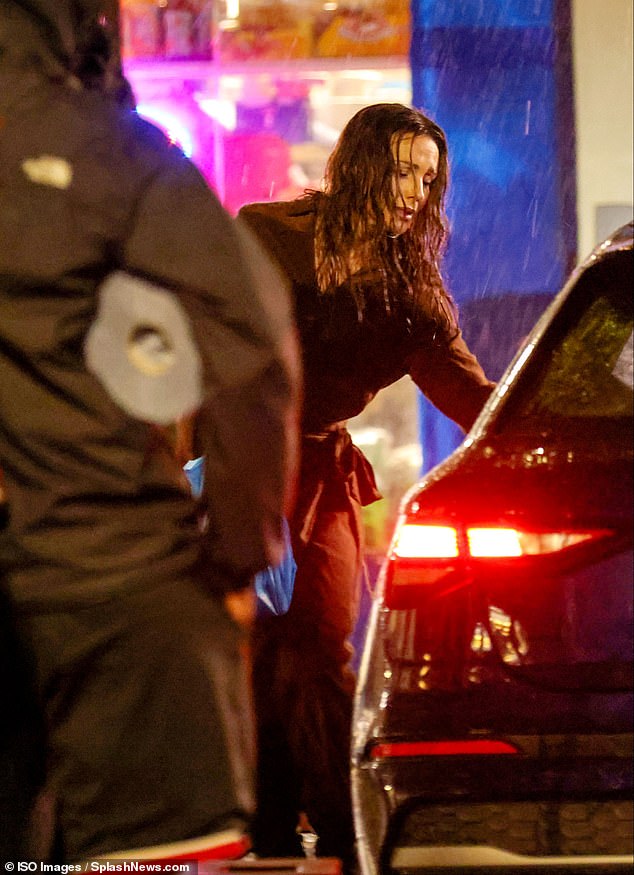 Following the exchange, a visibly upset Michelle was seen jumping into a waiting car
