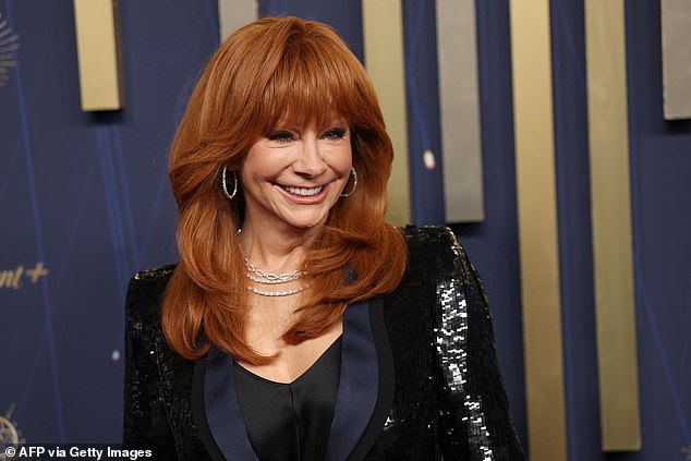 'The kids are doing well, they’re all bonding together and hanging out with each other, and taking it one day at a time,' Reba told Entertainment Tonight on Emmys red carpet on Sunday