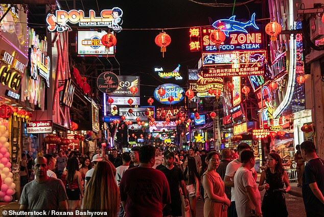 The strong Thai baht has seen tourism impacted, with the traditionally cheap destination for British holidaymakers suddenly much more expensive (Pictured: A tourist-filled street in the resort of Pattaya)