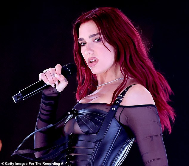 Singer Dua Lipa (pictured) has dumped her Jewish agent after he campaigned to stop controversial rappers Kneecap performing at Glastonbury, claiming they were fuelling anti-Semitism
