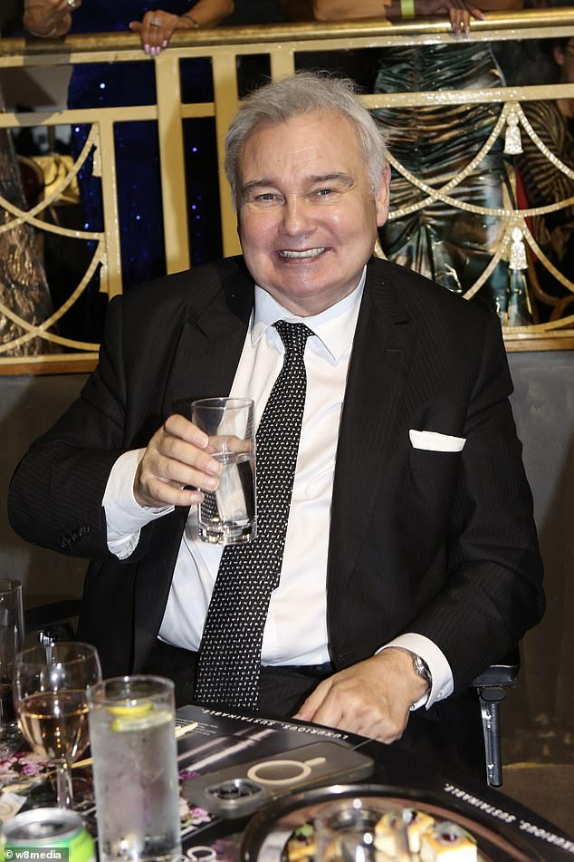 Eamonn looked dapper in a black suit with a white polka dot tie for the lavish night out while opting for a glass of water at the venue