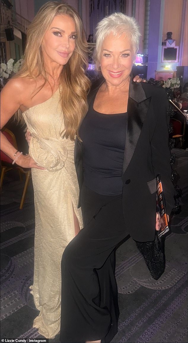 Lizzie Cundy, who presented an award on the night, dazzled in a one shoulder gown with a shimmering gold fabric that oozed glamour (pictured with Denise Welch)