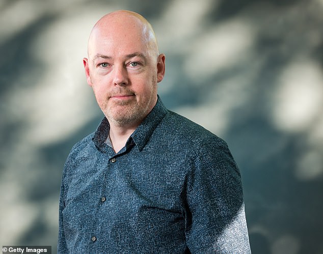 Famed Irish writer John Boyne, 54, has said his literary peers have tried to 'cancel' him over his views on transgender issues - but book sales have only gone up