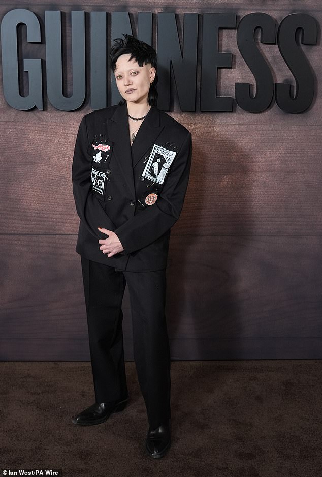On Tuesday night, brewery heiress Celeste, 35, stole the show in a black satin suit adorned with Guinness-themed patches and safety pins and sporting a punk-style mullet