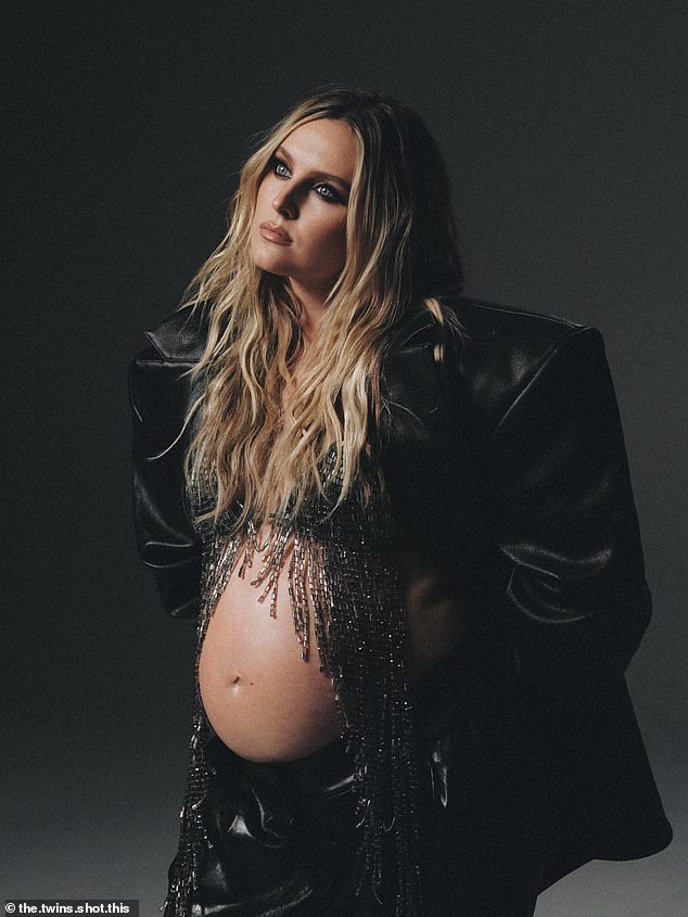 Perrie, 32, looked outstanding for the grungy shoot, wearing a very oversized blazer with padded shoulders