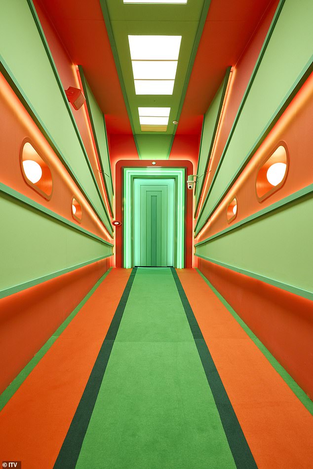 One corridor is decorated with clashing orange and green stripes