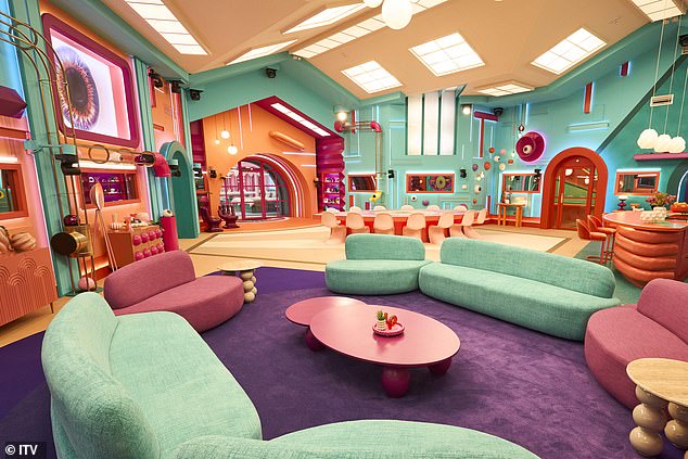 This leads into a living room that features purple carpets, blue and pink sofas and enormous neon lighting overhead