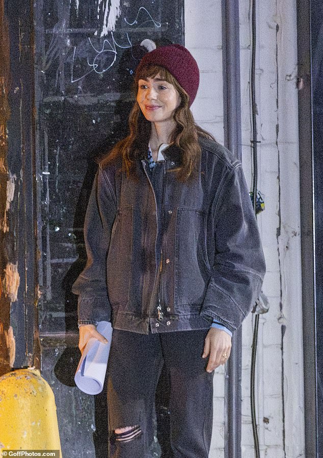 The actress may be in less glamorous surroundings than usual, but she was still seen smiling while filming for a forthcoming Amazon MGM film called Close Personal Friends