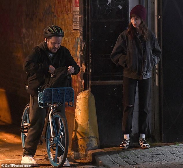 Lily, in character, was spotted looking at her dealer's bag as he gets set to take out the drugs