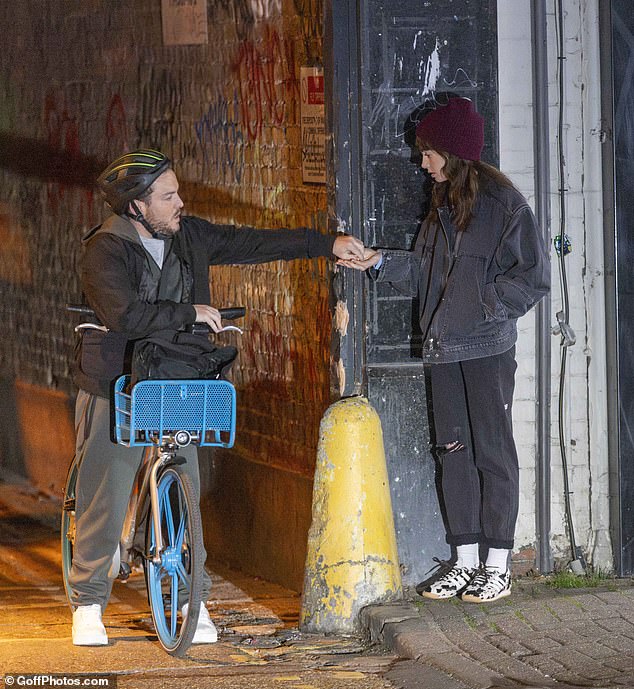 Wearing a black helmet atop his blue bike, the fictional drug dealer made a quick escape after handing Lily's character the drugs