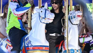 Kourtney Kardashian beamed with delight while riding the King Arthur Carrousel alongside her neighbor-turned-husband Travis Barker and their son Rocky Thirteen at Disneyland Park in Anaheim, CA on Monday