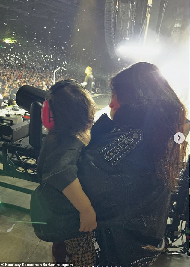 Kourtney and little Rocky have been joining the Grammy-nominated musician on the road as he performs with his nineties rock band, Blink-182 (pictured September 22)