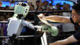 BEIJING, CHINA - AUGUST 10: Unitree Robotics robots humanoid robots compete in a boxing match during the 2025 World Robot Conference (WRC) at Beiren Yichuang International Convention and Exhibition Center on August 10, 2025 in Beijing, China. 