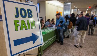 Jobless claims fall to 218,000, easing labor fears