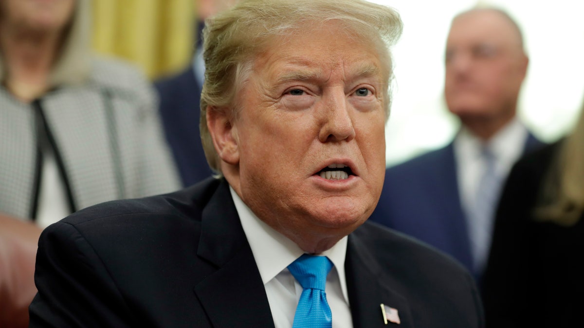 President Donald Trump speaks during a signing ceremony for "Space Policy Directive 4" in the Oval Office of the White House in Washington in 2019. 