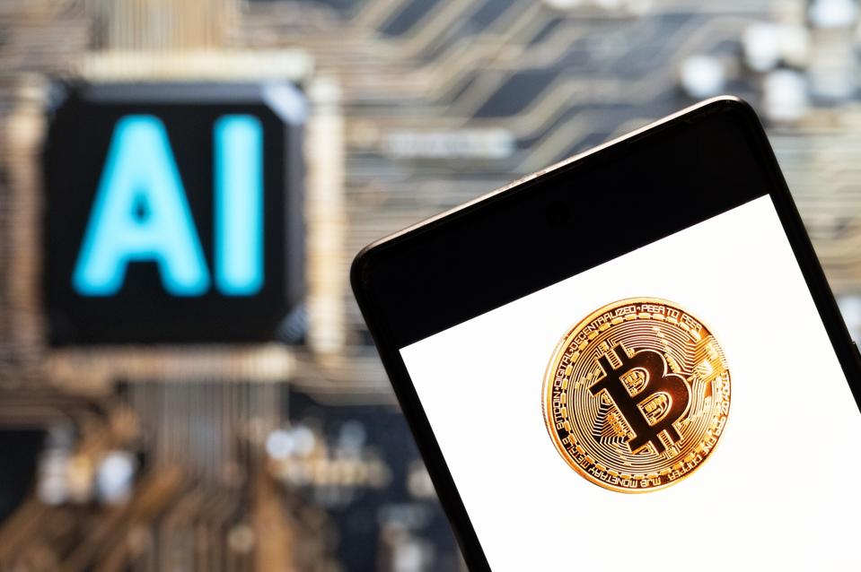 The cryptocurrency electronic cash Bitcoin (BTC, BCH) logo seen displayed on a smartphone with an Artificial intelligence (AI) chip and symbol in the background. 