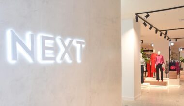 Next posts big sales and profits rise, but sounds warning on UK job market