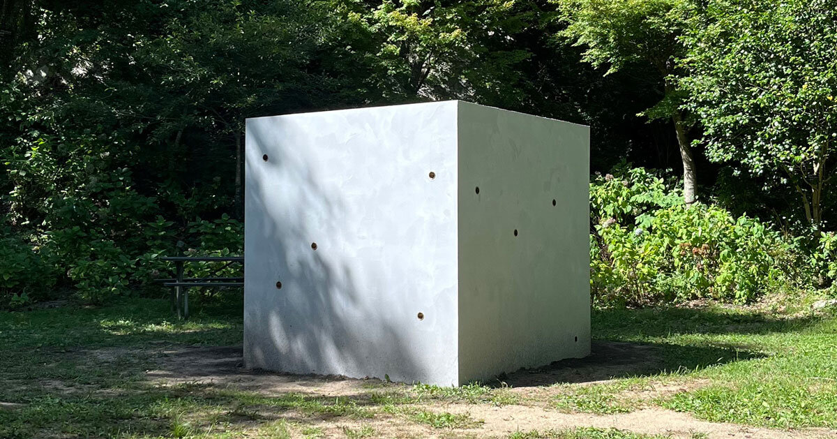 twin concrete cube sculptures link rokko and berlin