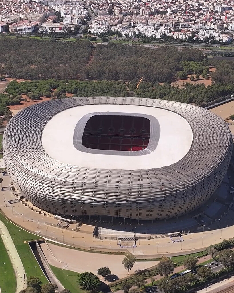 19,200 golden triangles compose luminous facade of populous' stadium in morocco