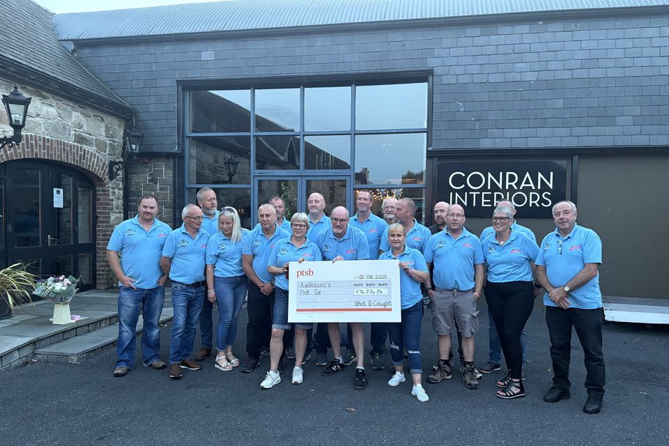 The cheque presentation for Aoibheann's Pink Tie.